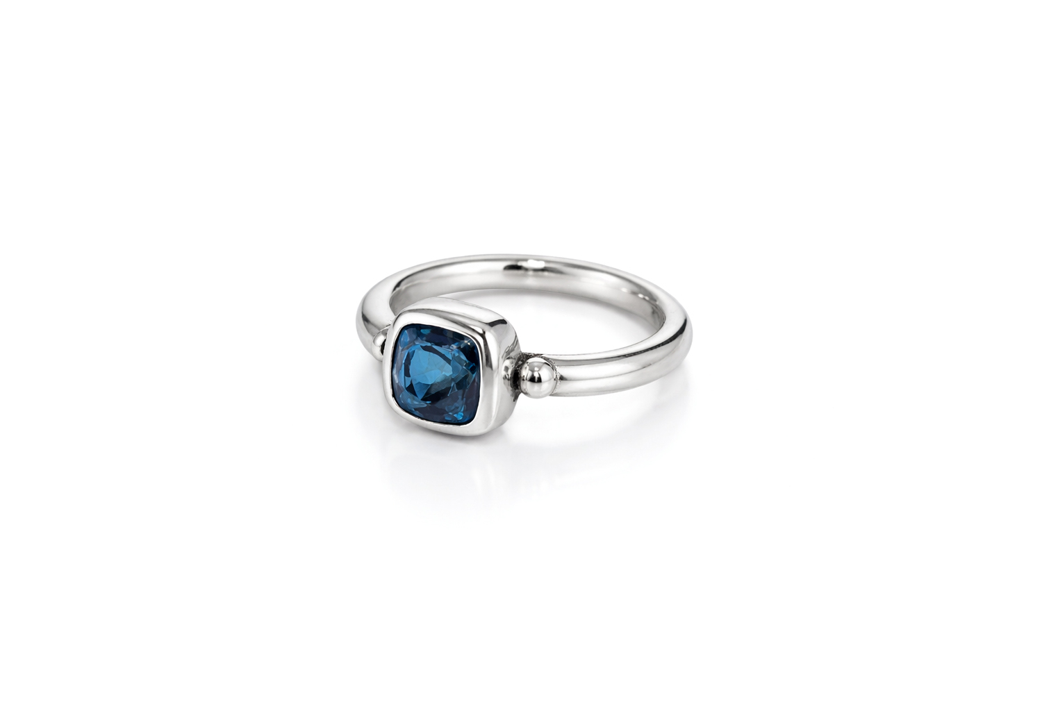 cushion cut blue gemstone silver bezel set ring