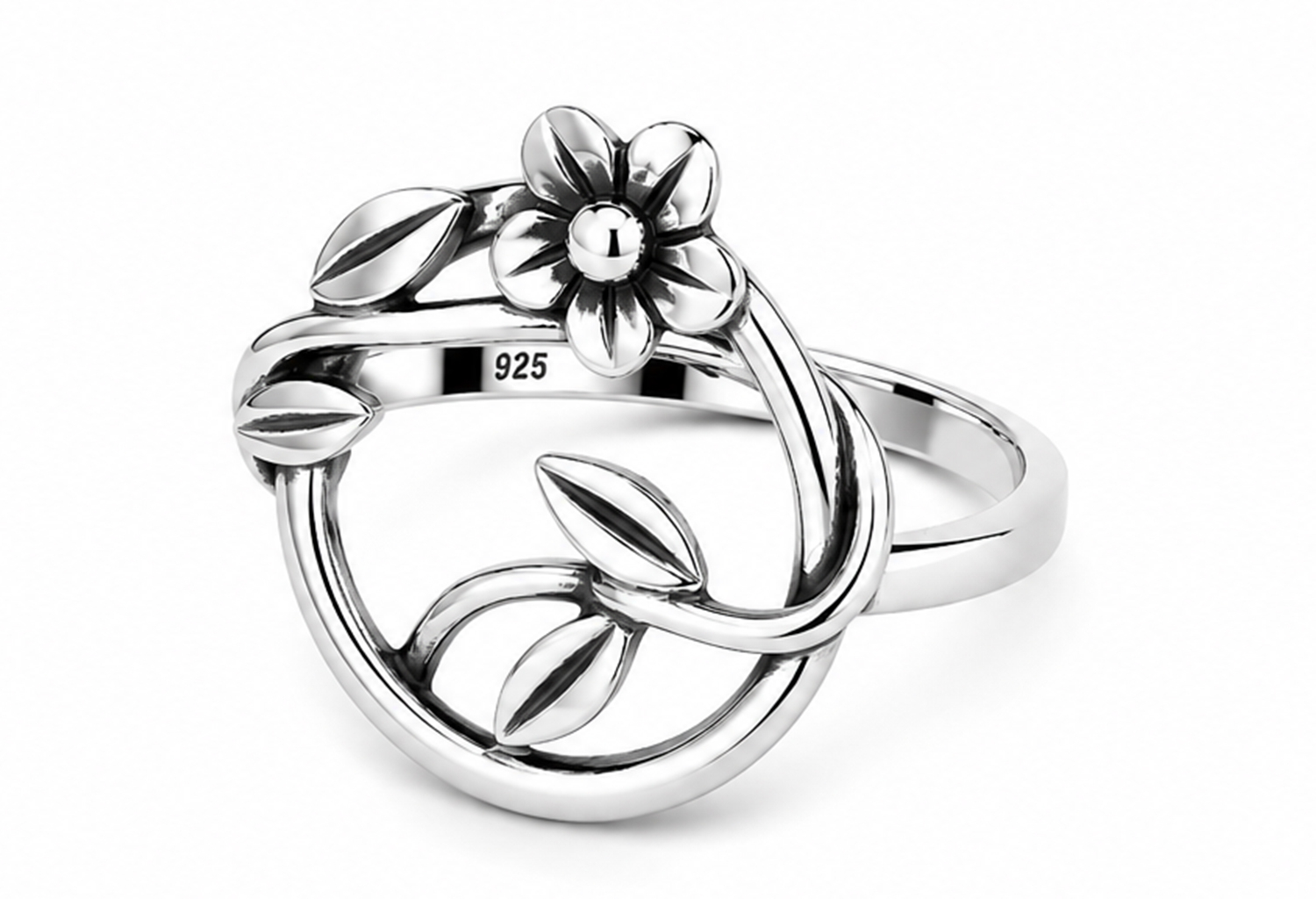 Handmade sterling silver floral ring featuring a sculpted flower, flowing vine, and polished leaves within an elegant open oval frame with an ultra mirror polished finish on a white background.
