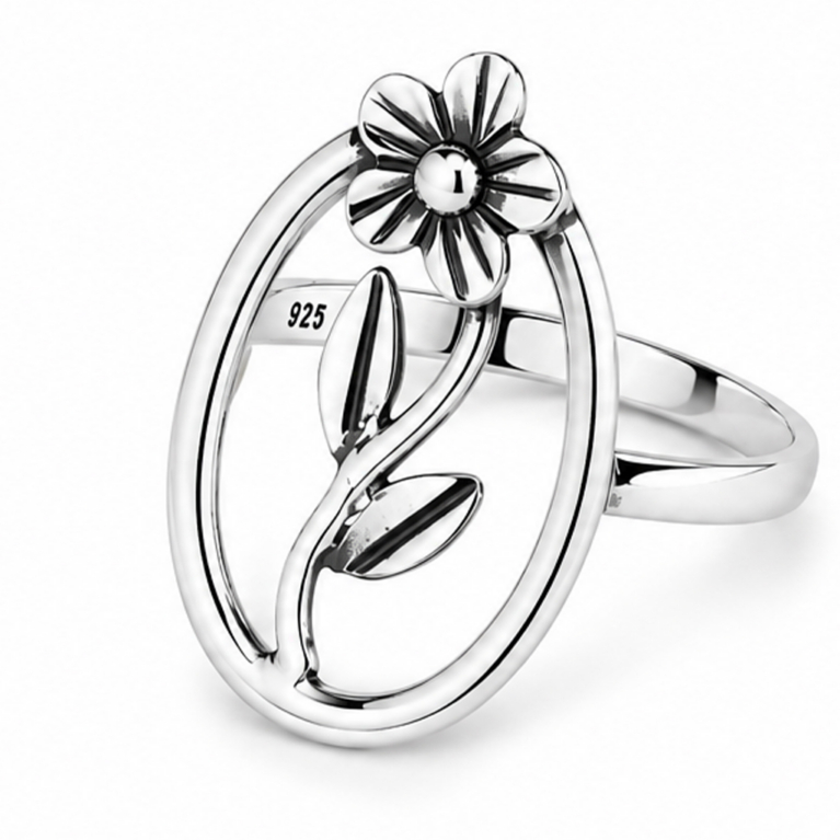 Handmade sterling silver floral oval ring featuring a sculpted flower, flowing vine, and polished leaves within an elegant open oval frame with an ultra mirror polished finish on a white background.