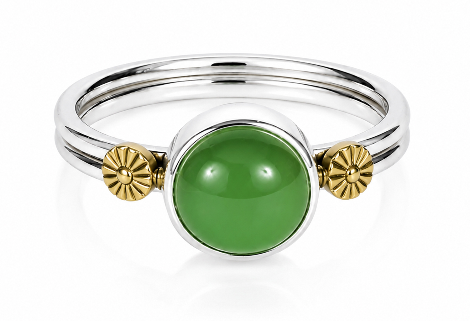 Handmade sterling silver bezel ring with a round green chalcedony cabochon gemstone and 18K gold floral accents, polished artisan statement ring on a white background.