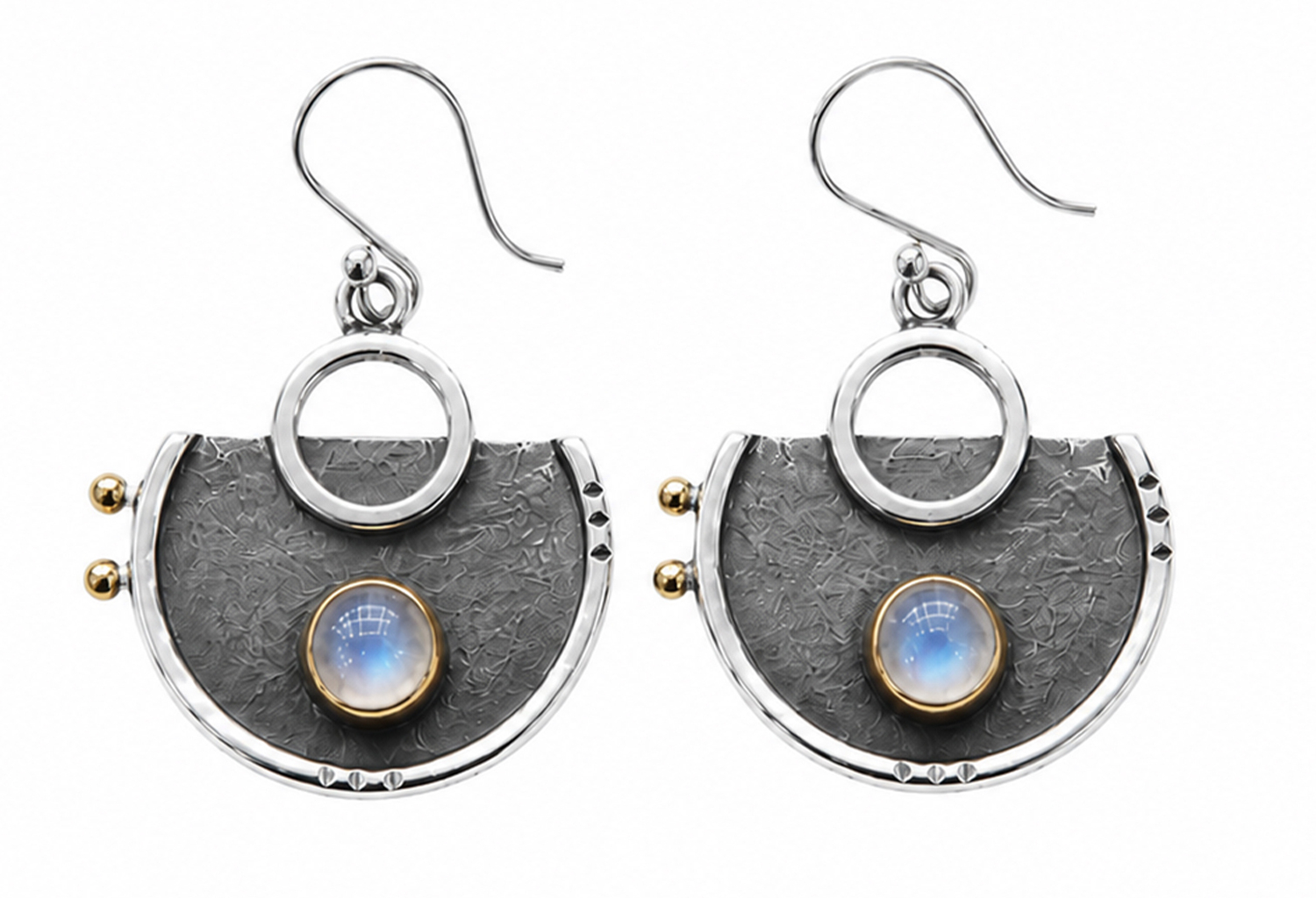 Handmade 925 sterling silver statement earrings featuring natural Moonstone cabochons in gold bezel settings with oxidized hand-textured semi-circle designs and French hooks.