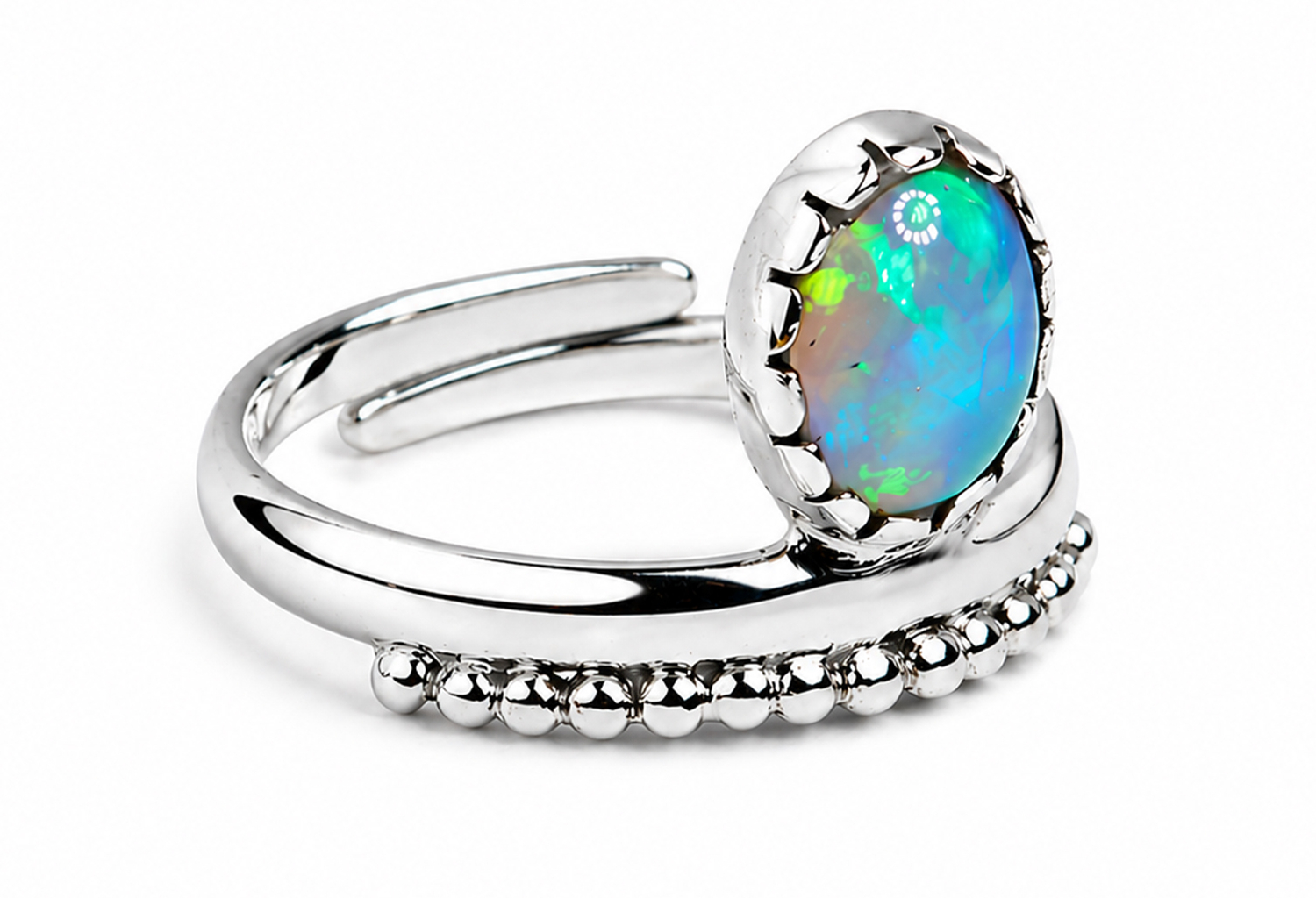 Handmade sterling silver adjustable ring featuring a genuine oval opal in a decorative bezel setting with polished bead detailing and an ultra mirror polished 925 sterling silver open band on a white background.