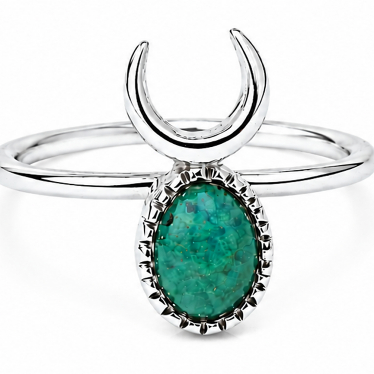 Handmade sterling silver crescent moon ring featuring a genuine oval turquoise gemstone in a decorative bezel setting with an ultra mirror polished 925 sterling silver band on a white background.