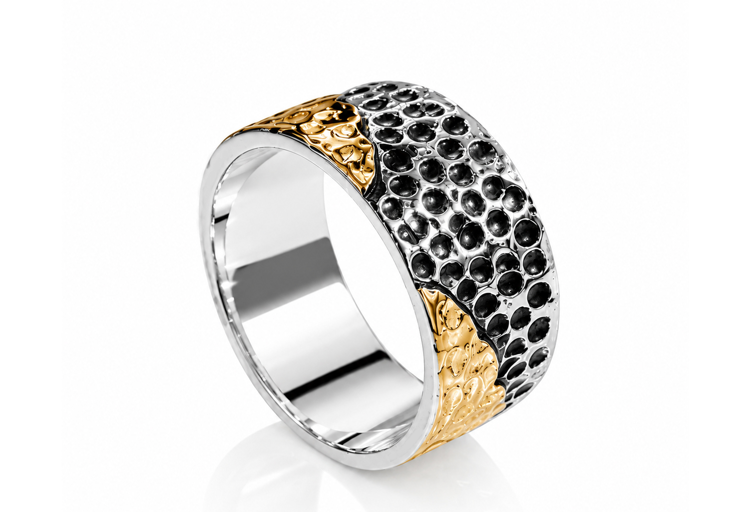 Handcrafted sterling silver hammered band ring with textured finish and gold accents on a white background.