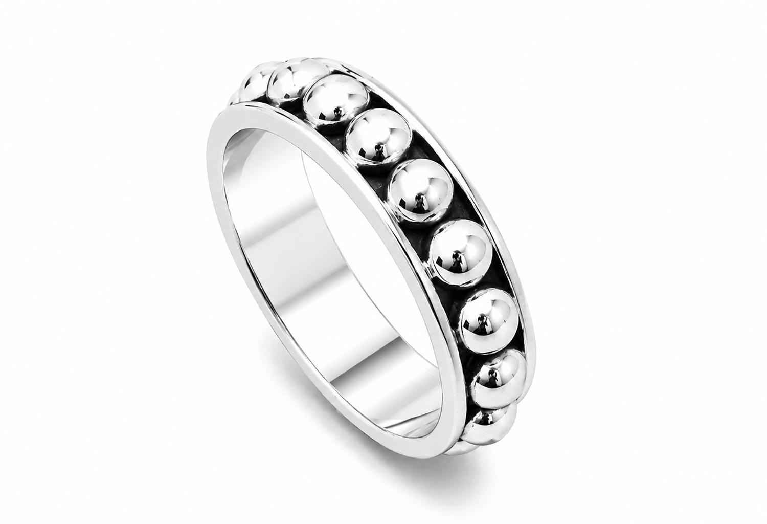 Handmade sterling silver beaded ring featuring polished bubble detailing with oxidized accents and an ultra mirror finish on a white background.