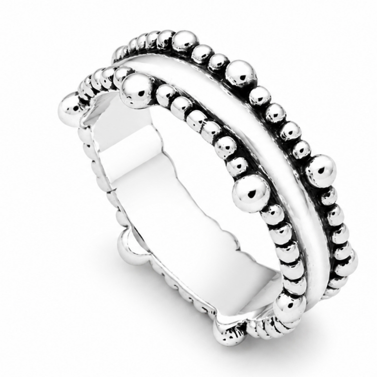 Handmade sterling silver double wave beaded ring featuring sculptural curves, graduated polished silver beads, oxidized accents, and an ultra mirror finish on a white background.