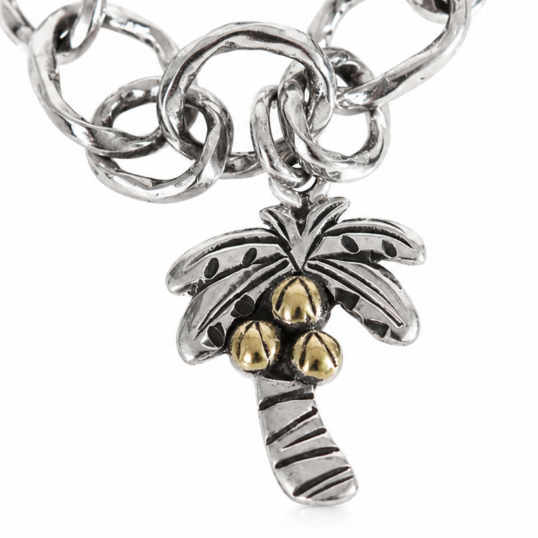 Handmade 925 sterling silver palm tree charm with gold-tone coconuts, tropical design, mirror-polished finish, and artisan detailing by Barha Fine.